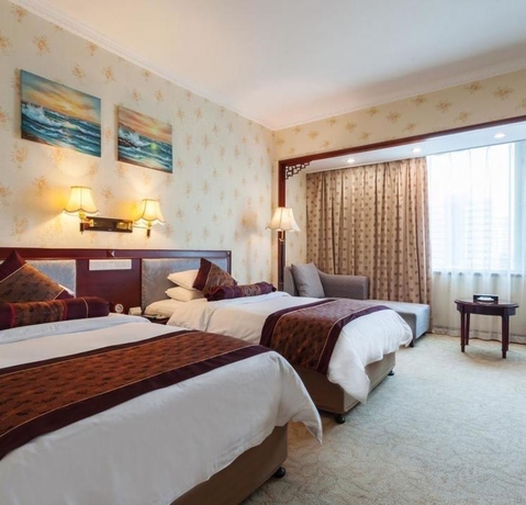 Imagen de la habitación del Hotel Xiamen Huaqiao. Foto 16