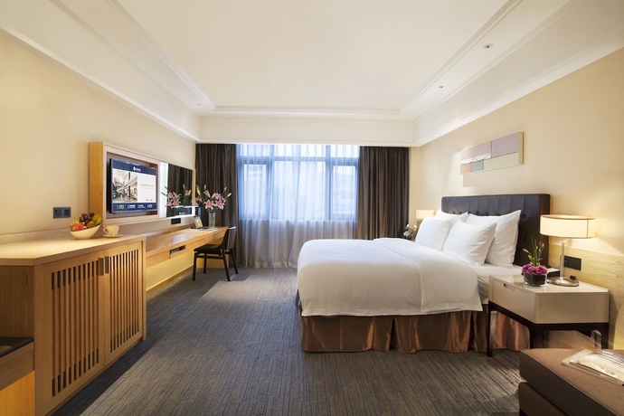 Imagen de la habitación del Hotel Xiamen Huli Yihao. Foto 11