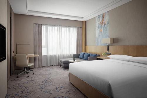 Imagen de la habitación del Hotel Xiamen Marriott Haicang. Foto 3