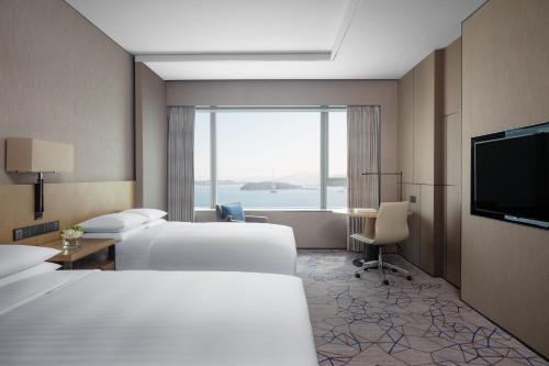 Imagen de la habitación del Hotel Xiamen Marriott Haicang. Foto 4