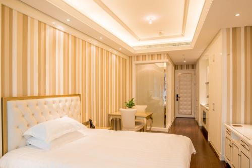 Imagen de la habitación del Hotel Xiamen Ocean View Suite - Xiamen University Twin Towers Branch. Foto 16