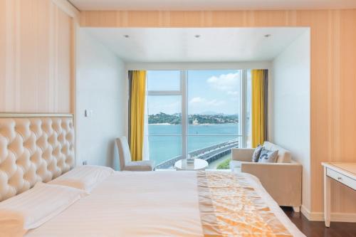 Imagen de la habitación del Hotel Xiamen Ocean View Suite - Xiamen University Twin Towers Branch. Foto 17