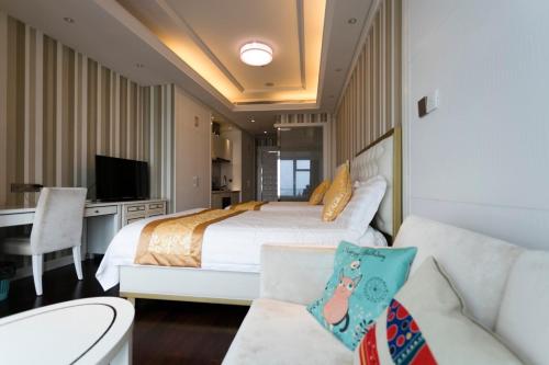 Imagen de la habitación del Hotel Xiamen Ocean View Suite - Xiamen University Twin Towers Branch. Foto 18