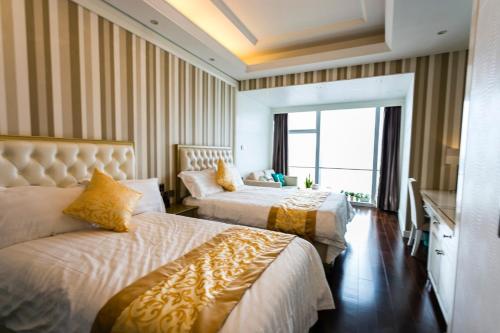 Imagen de la habitación del Hotel Xiamen Ocean View Suite - Xiamen University Twin Towers Branch. Foto 19
