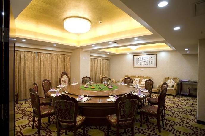 Imagen del bar/restaurante del Hotel Xiamen Plaza, Xiamen. Foto 4