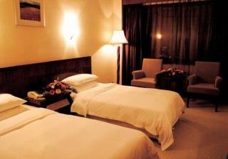 Imagen de la habitación del Hotel Xiamen Plaza, Xiamen. Foto 4