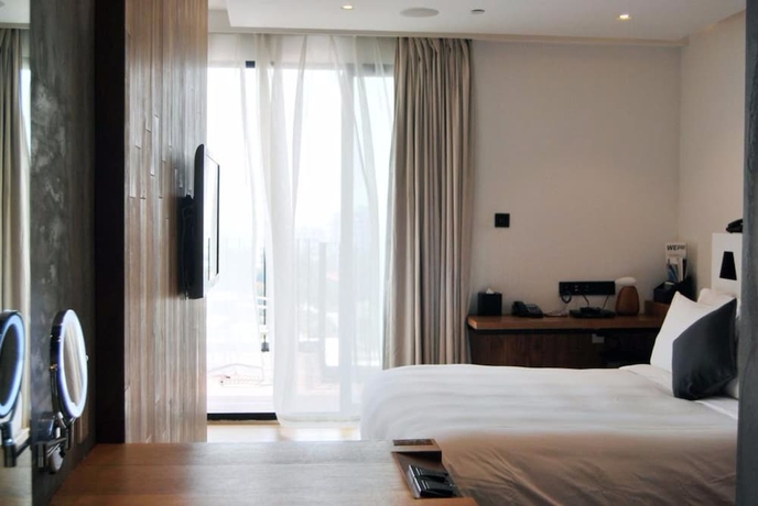 Imagen de la habitación del Hotel Xiamen Wind. Foto 14