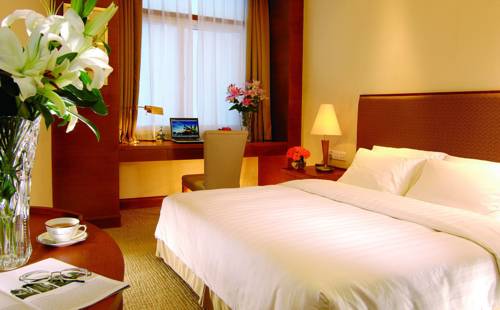 Imagen de la habitación del Hotel Xiamen Xiang An Yi Hao. Foto 1