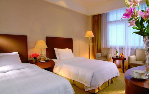 Imagen de la habitación del Hotel Xiamen Xiang An Yi Hao. Foto 2