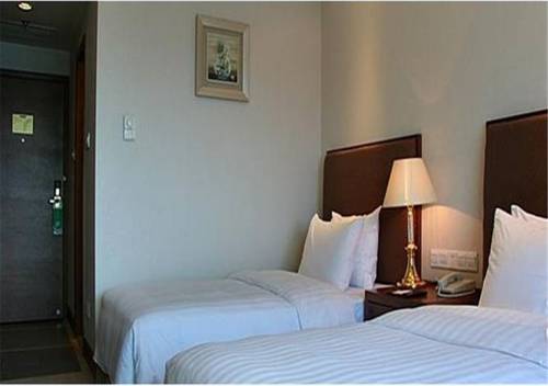 Imagen de la habitación del Hotel Xiamen Xiang An Yi Hao. Foto 6