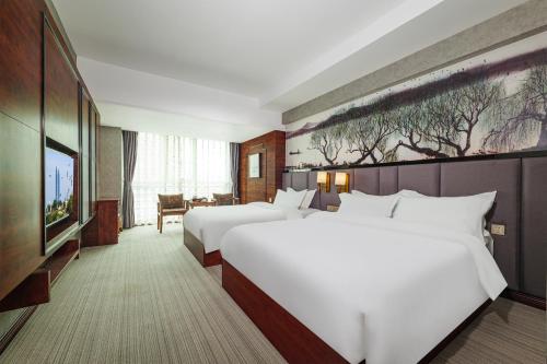 Imagen de la habitación del Hotel Xiamen Xiangzun - Huijing Plaza Branch. Foto 20