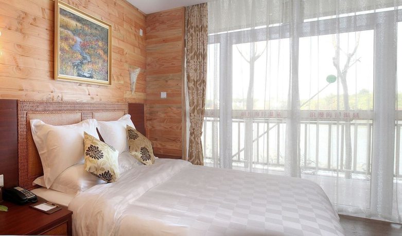 Imagen de la habitación del Hotel Xiamen Xingbowan(Tianmu) Hot Spring Resort. Foto 11