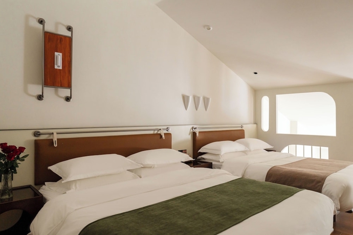 Imagen de la habitación del Hotel Xiamen Yidu Trendy Homestay. Foto 3