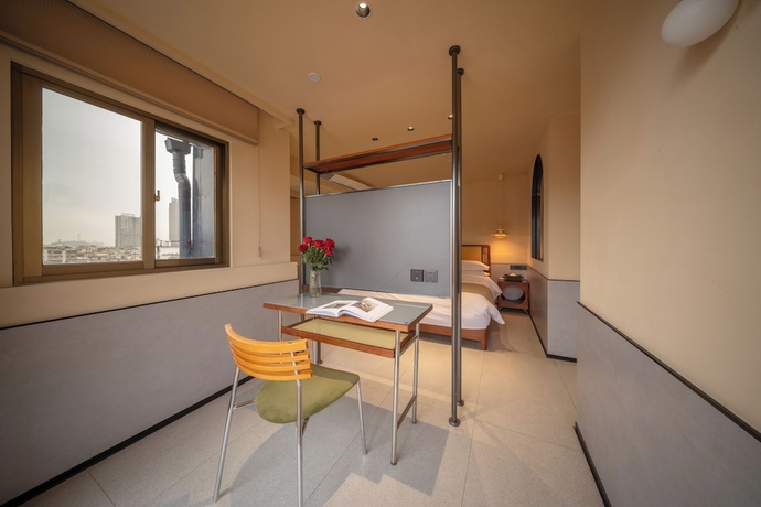 Imagen de la habitación del Hotel Xiamen Yidu Trendy Homestay. Foto 7
