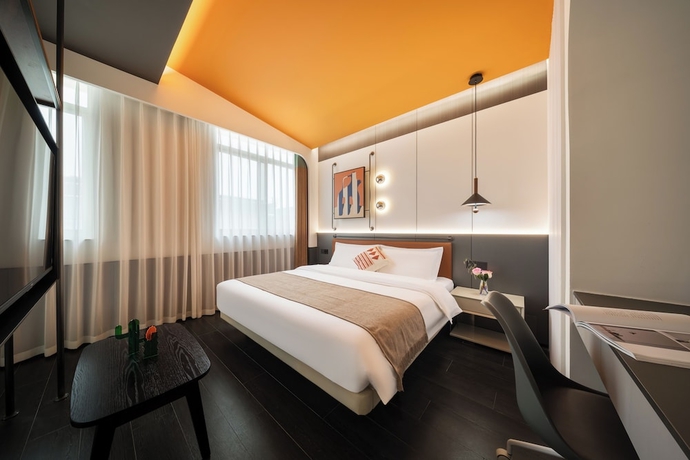 Imagen de la habitación del Hotel Xiamen Yidu Trendy Homestay. Foto 8