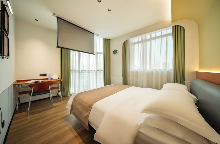 Imagen de la habitación del Hotel Xiamen Yidu Trendy Homestay. Foto 12