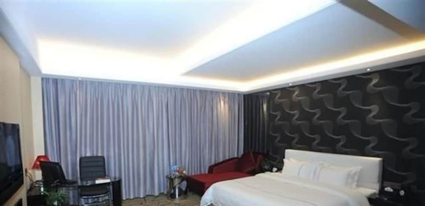 Imagen de la habitación del Hotel Xiamen landscape Hotel. Foto 9