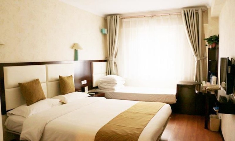 Imagen de la habitación del Hotel Xi'an Chenggong International. Foto 7