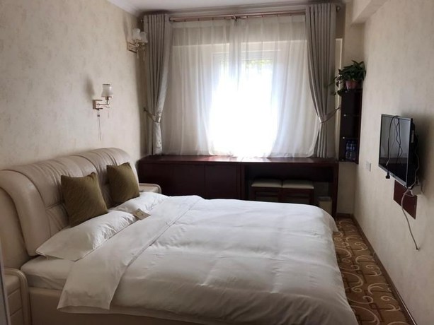 Imagen de la habitación del Hotel Xi'an Chenggong International. Foto 9