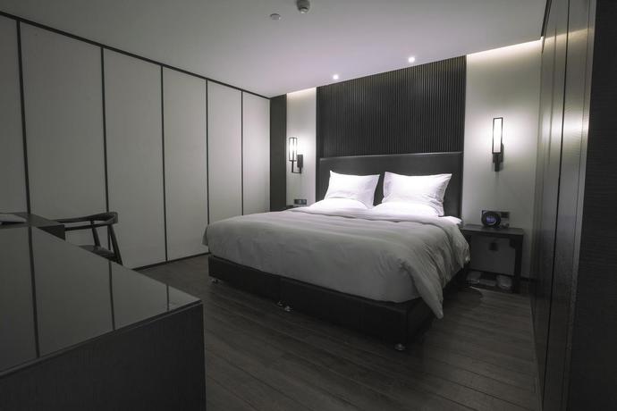 Imagen de la habitación del Hotel Xi'an Eastern House Boutique. Foto 12