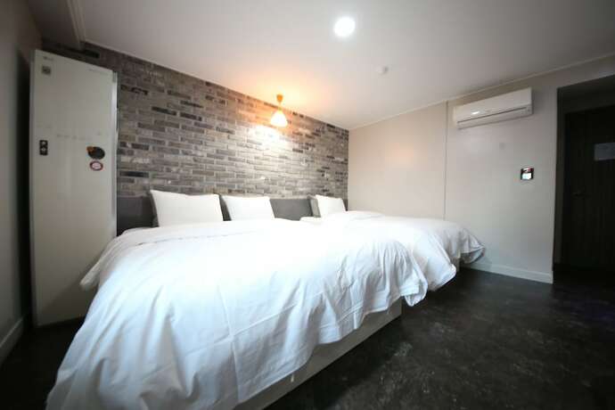 Imagen de la habitación del Hotel Xian. Foto 12