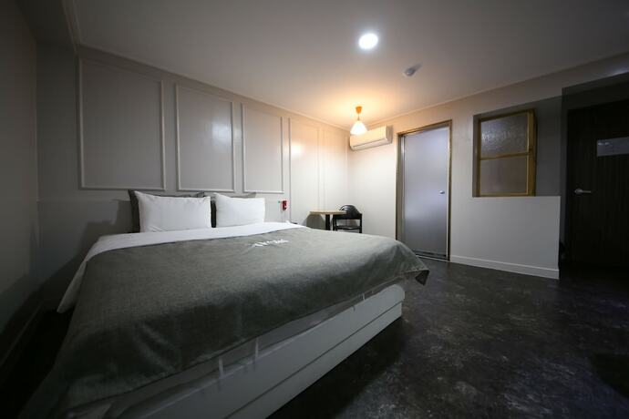 Imagen de la habitación del Hotel Xian. Foto 15