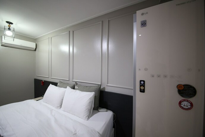 Imagen de la habitación del Hotel Xian. Foto 16