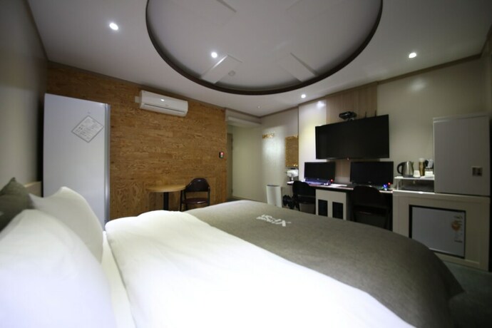 Imagen de la habitación del Hotel Xian. Foto 18