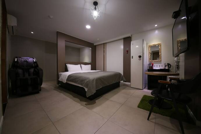 Imagen de la habitación del Hotel Xian. Foto 19