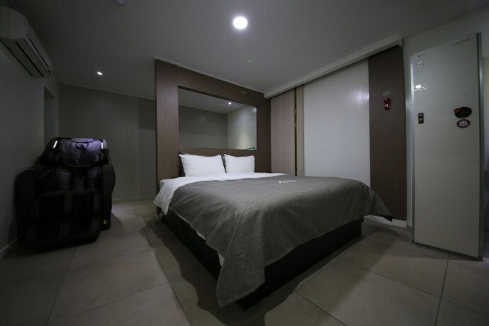 Imagen de la habitación del Hotel Xian. Foto 22