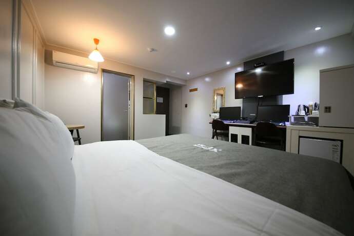 Imagen de la habitación del Hotel Xian. Foto 23