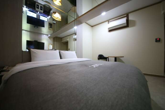 Imagen de la habitación del Hotel Xian. Foto 24