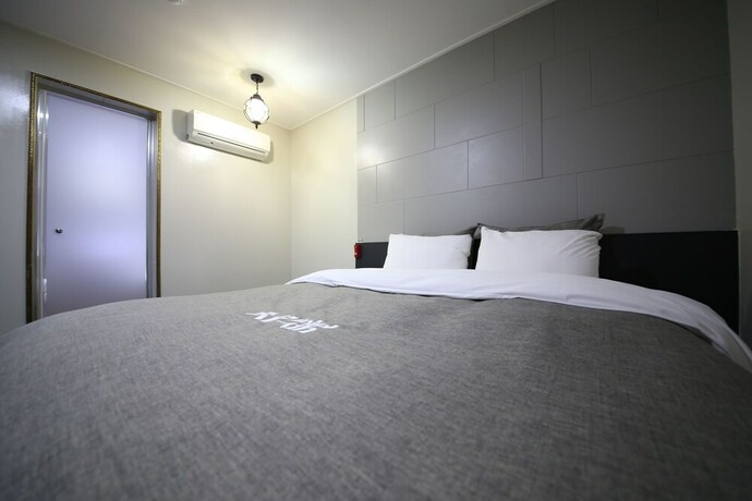 Imagen de la habitación del Hotel Xian. Foto 25