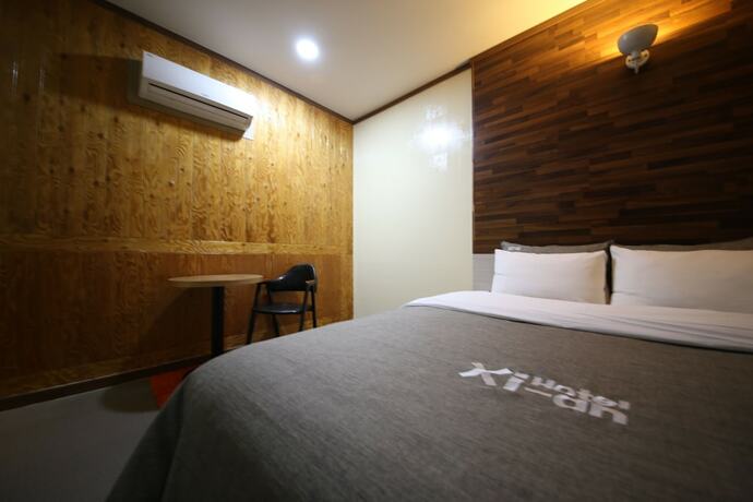 Imagen de la habitación del Hotel Xian. Foto 26