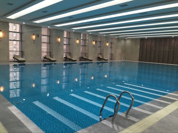 Imagen de la piscina del Hotel Xian Grand New Century Hotel. Foto 3