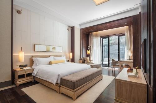 Imagen de la habitación del Hotel Xian Huaqingyutang, Lintong. Foto 7