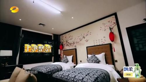 Imagen de la habitación del Hotel Xi'an Impression Nanhu Lake Homestay. Foto 10