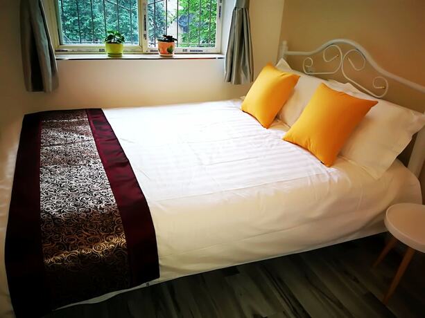 Imagen de la habitación del Hotel Xi'an Jintang Apartment. Foto 19