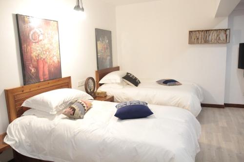 Imagen de la habitación del Hotel Xian Ju Bu She Ban Juan Min Su. Foto 6