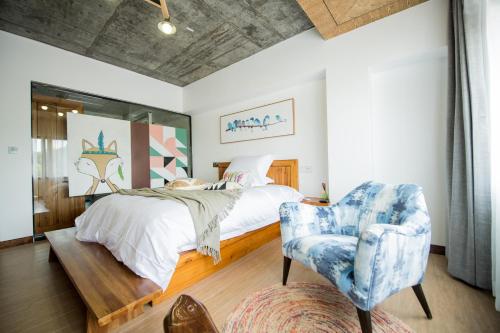 Imagen de la habitación del Hotel Xian Ju Bu She Ban Juan Min Su. Foto 8