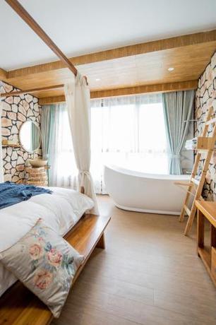 Imagen de la habitación del Hotel Xian Ju Bu She Ban Juan Min Su. Foto 9