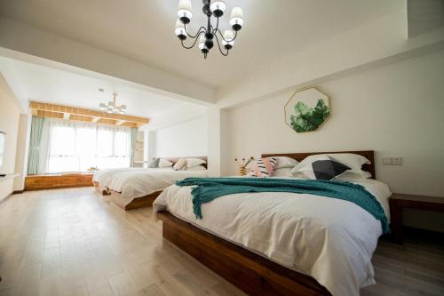 Imagen de la habitación del Hotel Xian Ju Bu She Ban Juan Min Su. Foto 10