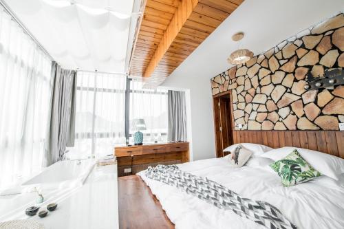 Imagen general del Hotel Xian Ju Bu She Ban Juan Min Su. Foto 2