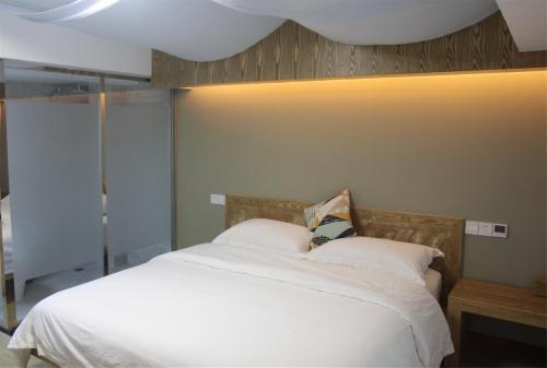 Imagen general del Hotel Xian Ju Bu She Ban Juan Min Su. Foto 4