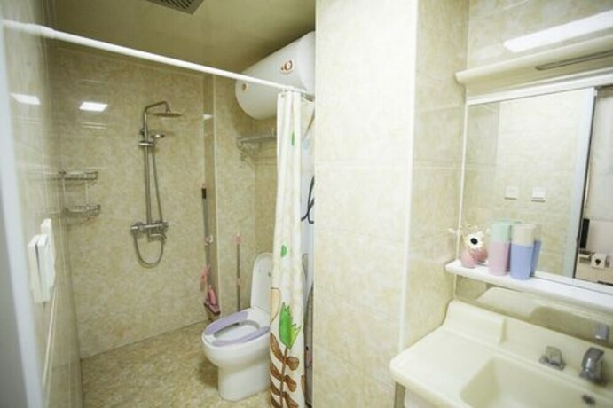 Imagen de la habitación del Hotel Xi'an Kivi Apartment. Foto 10