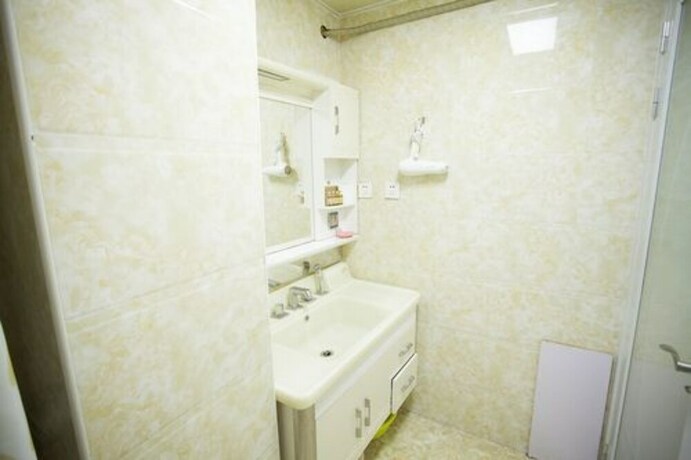 Imagen de la habitación del Hotel Xi'an Kivi Apartment. Foto 16