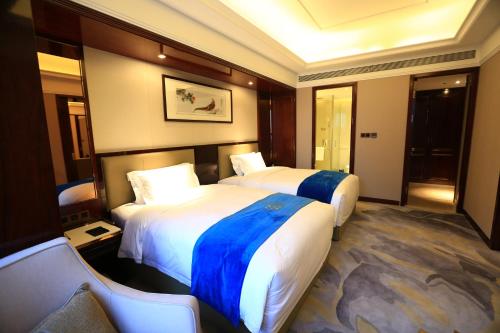 Imagen de la habitación del Hotel Xi'an Lanxi International. Foto 4