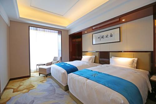 Imagen de la habitación del Hotel Xi'an Lanxi International. Foto 5