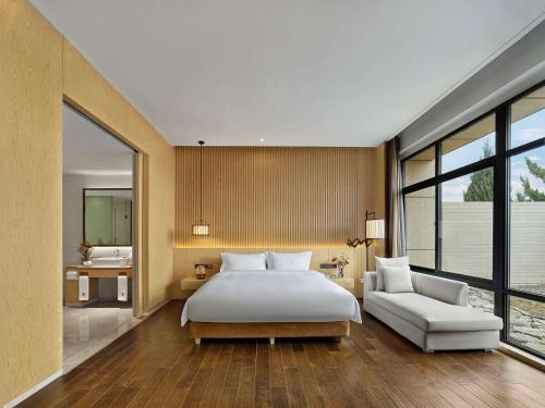 Imagen general del Hotel Xi\'an Lintong Garrya. Foto 11