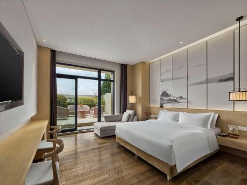Imagen general del Hotel Xi\'an Lintong Garrya. Foto 13